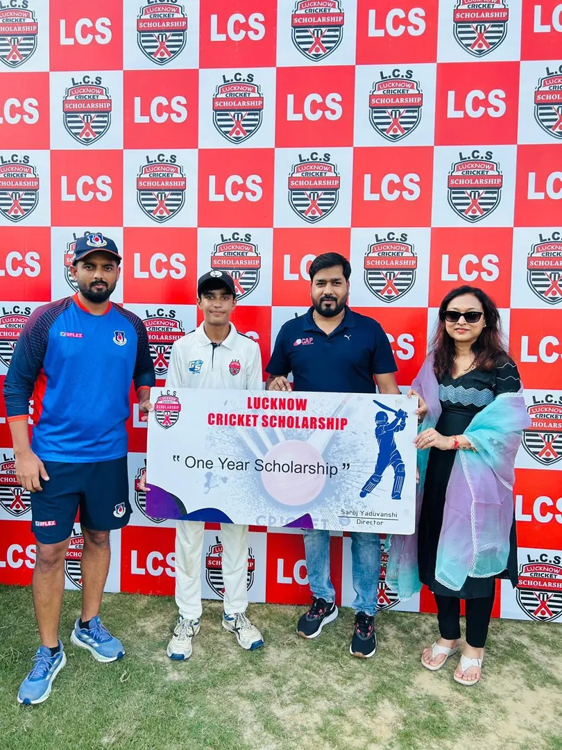 Scholarship students with coaches